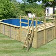 Foto van Karibu houten zwembad 4D 690 x 400 x 124 cm - blauwe liner + skimmer + terras