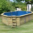 Foto van Karibu houten zwembad X4 610 x 400 x 124 cm met blauwe liner + skimmer