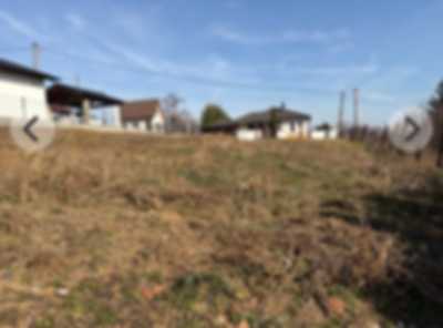 Perceel van 3059 m2 te koop met stenen tuinhuis