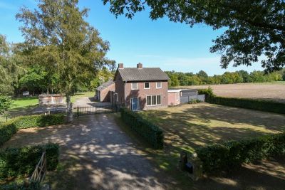 Woning met ruim perceel te koop in buitengebied