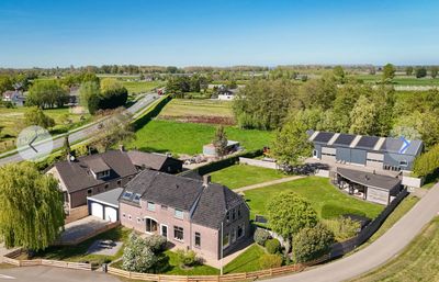Woonboerderij met veranda en loods