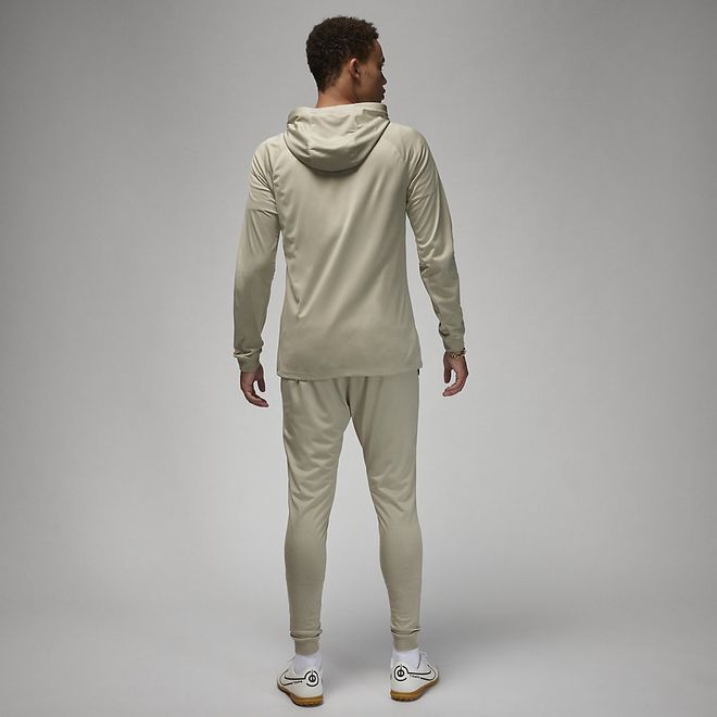 Afbeelding van Paris Saint-German Strike Nike Dri-FIT Knit Voetbaltrainingspak met Capuchon Stone