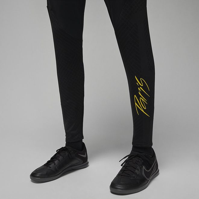 Afbeelding van Paris Saint-Germain Strike Jordan Dri-FIT knit Voetbalbroek Black Tour Yellow