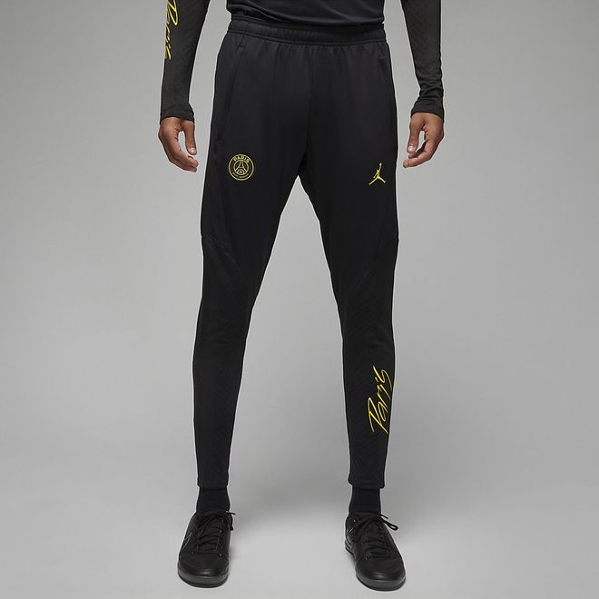Afbeelding van Paris Saint-Germain Strike Jordan Dri-FIT knit Voetbalbroek Black Tour Yellow