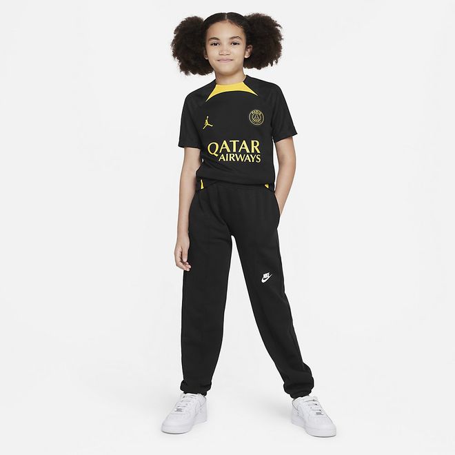 Afbeelding van Paris Saint-Germain Strike Jordan Dri-FIT Voetbaltrainingshirt Kids Black Tour Yellow