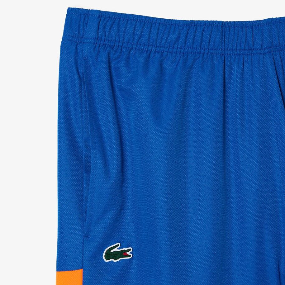 Lacoste discount trainingspak oranje