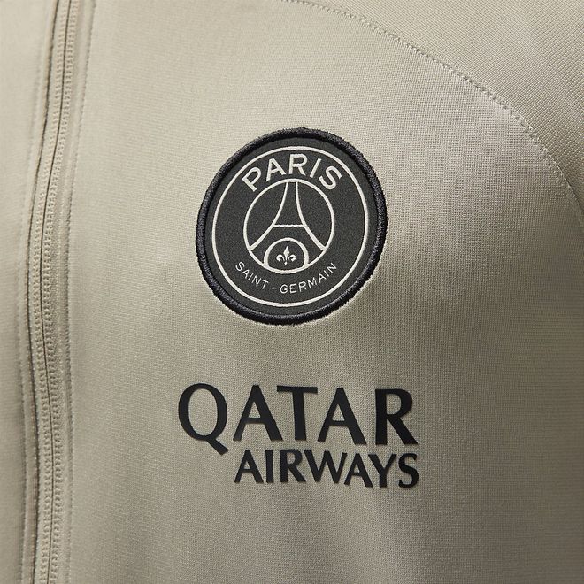 Afbeelding van Paris Saint-German Strike Nike Dri-FIT Knit Voetbaltrainingspak met Capuchon Stone