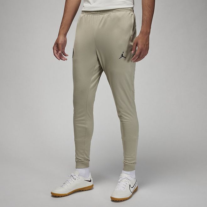 Afbeelding van Paris Saint-German Strike Nike Dri-FIT Knit Voetbaltrainingspak met Capuchon Stone