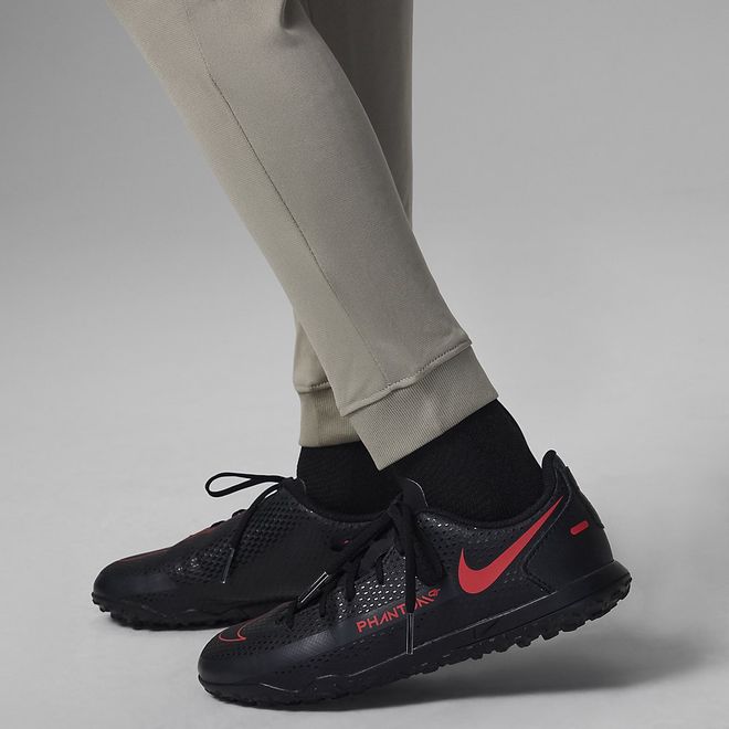 Afbeelding van Paris Saint-German Strike Nike Dri-FIT Knit Voetbaltrainingspak met Capuchon Kids Stone