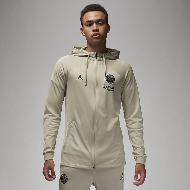 Afbeelding van Paris Saint-German Strike Nike Dri-FIT Knit Voetbaltrainingspak met Capuchon Stone
