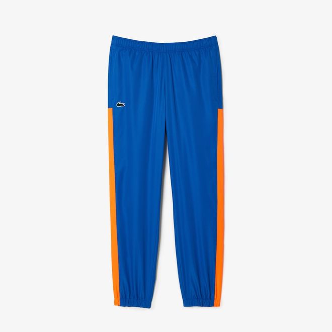 Afbeelding van Lacoste Trainingspak Blauw Oranje Wit