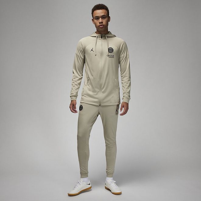 Afbeelding van Paris Saint-German Strike Nike Dri-FIT Knit Voetbaltrainingspak met Capuchon Stone