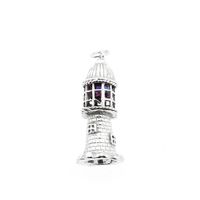 Silver pendant of a lighthouse