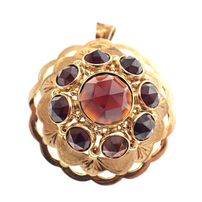 Image 1 of Vintage gold pendant/brooch with garnet stones