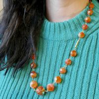 Carnelian bead necklace strung on gold