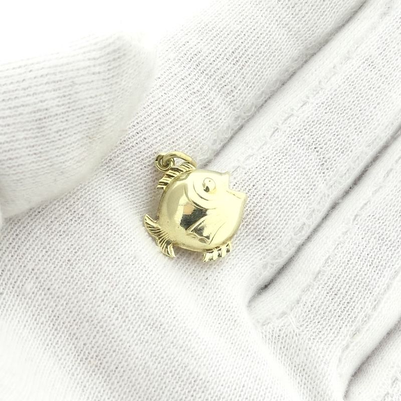 Image 6 of Gold pendant of a fish.