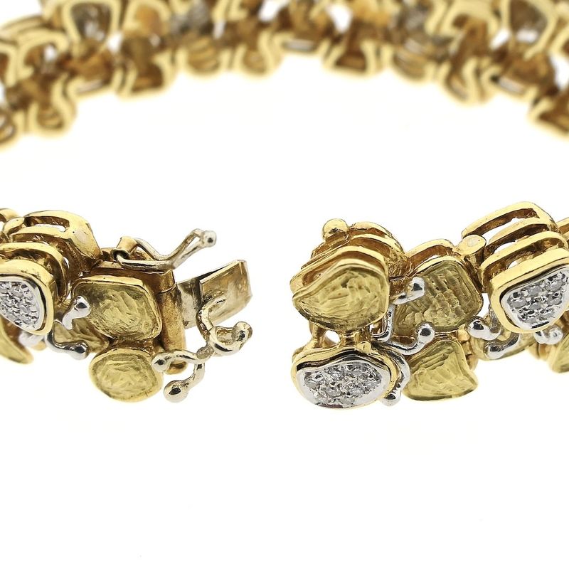 Image 8 of Two-tone gold fantasy bracelet with 0.525 ct diamond.