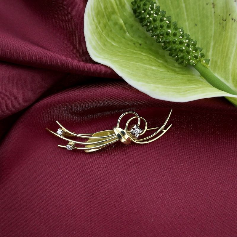 Image 2 of Golden fantasy brooch with diamonds; 0.15 ct.