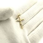 Image 7 of Gold pendant of a cross with pattern.