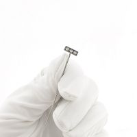 White gold lapel pin with diamonds; 0.15 ct.