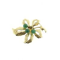 Golden oak leaf brooch with Imperial jade