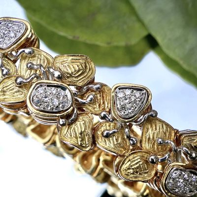 Two-tone gold fantasy bracelet with 0.525 ct diamond. Image 2 of Two-tone gold fantasy bracelet with 0.525 ct diamond.