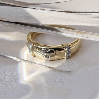 Image 2 of 18-karat two-tone gold ring with a heart and a 0.07-ct diamond.
