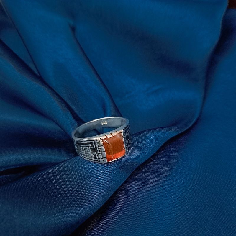 Image 6 of Silver ring with orange zirconia and Maori pattern