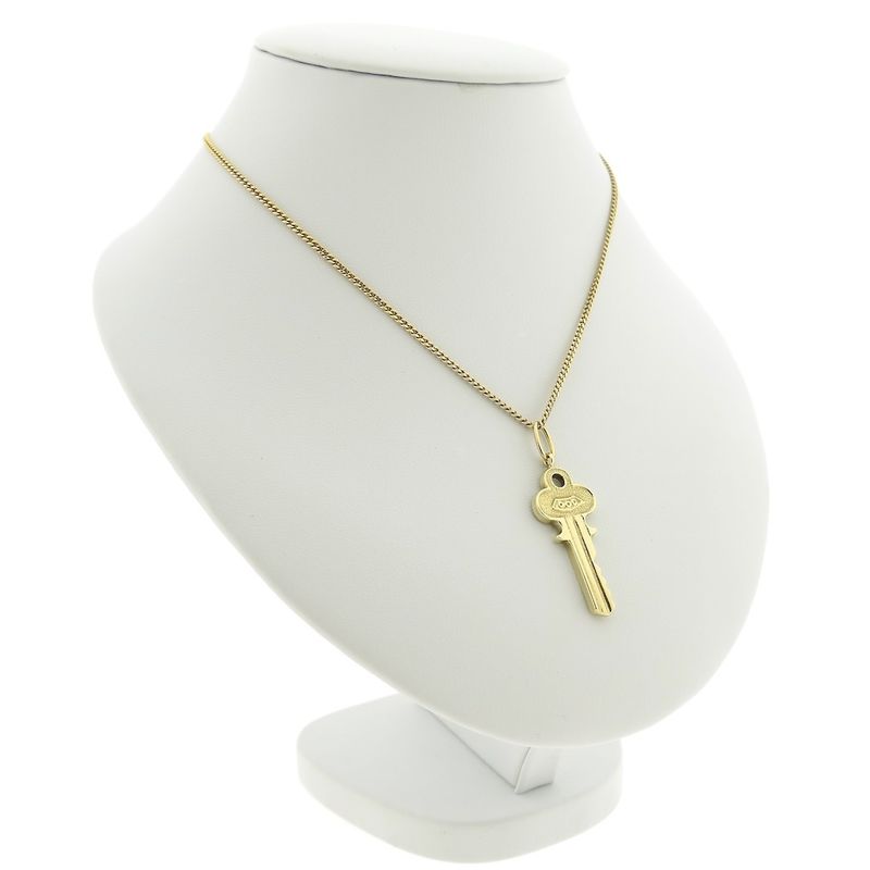 Image 4 of 18 carat gold pendant of a key
