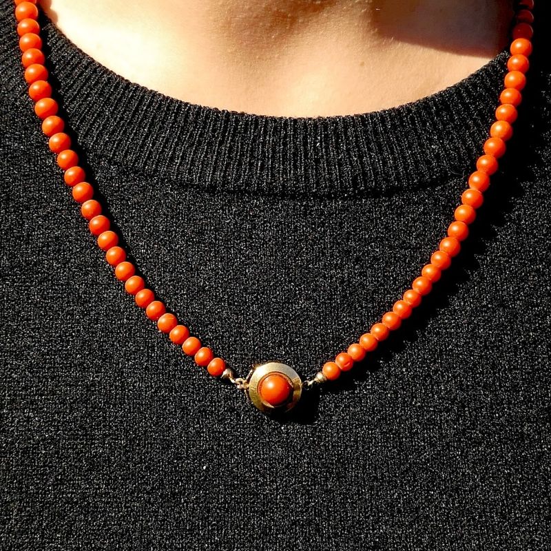 Image 10 of Antique blood coral bead necklace with gold decorative clasp.