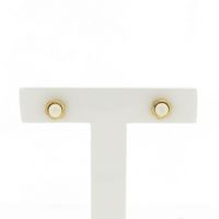 Gold stud earrings with pearl