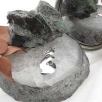 Silver pendant with a convex design