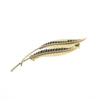 Gold brooch with two feathers