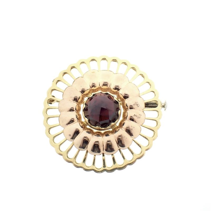 Image 1 of Two-tone gold brooch with garnet stone