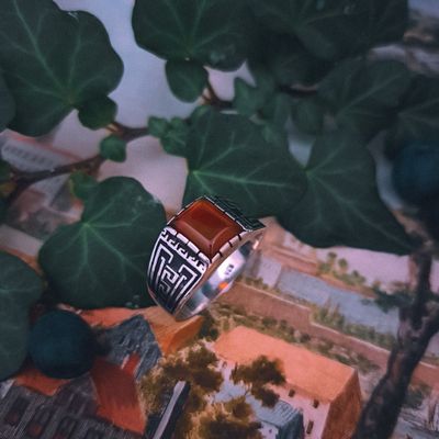 Image 2 of Silver ring with orange zirconia and Maori pattern