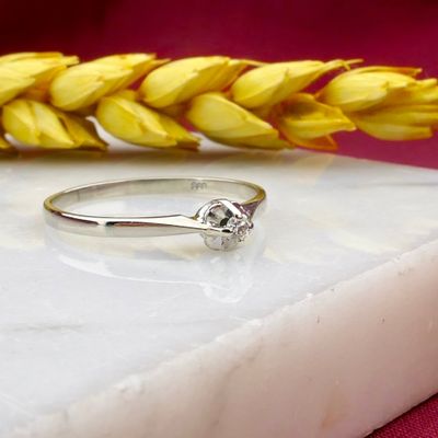 Image 2 of White gold solitaire ring with diamond; 0.025 ct.
