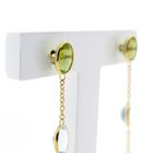 Image 4 of 18K gold stud earrings set with a mix of gemstones