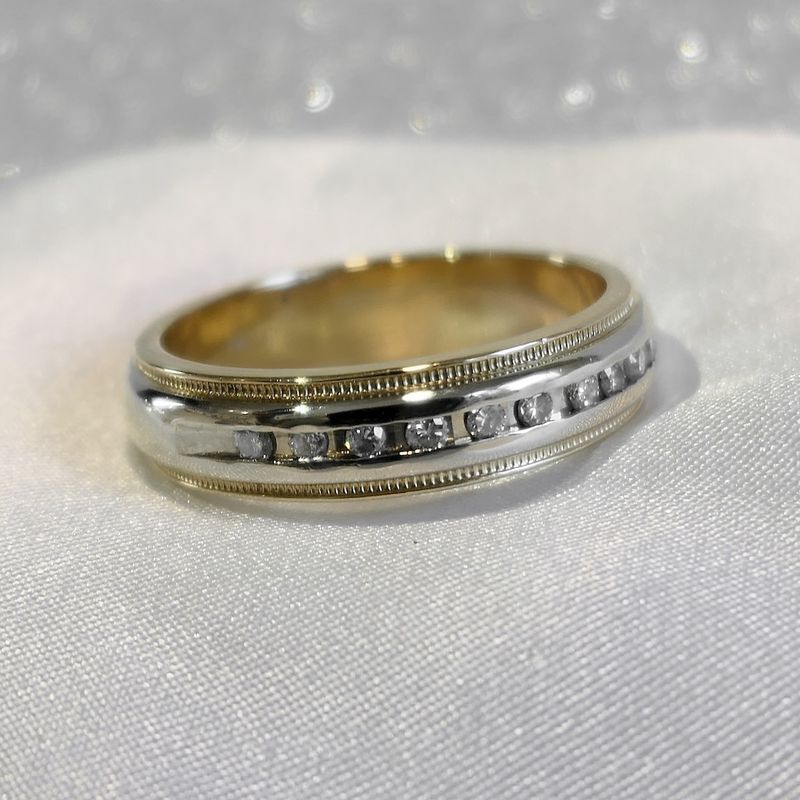 Image 2 of Novell bicolor gold ring with 0.10 ct diamond.