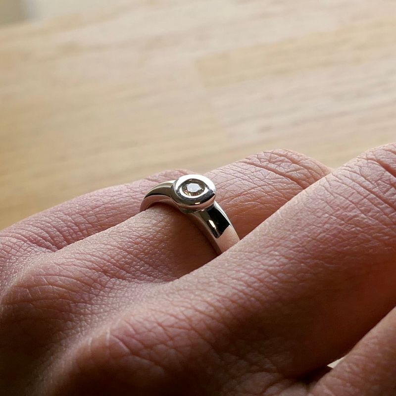 Image 10 of White gold solitaire ring with diamond; 0.12 ct.