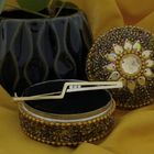 Image 2 of Two-tone gold long narrow brooch with diamonds; 0.15 ct.