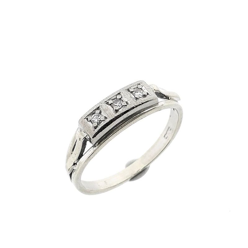 Image 1 of White gold ring with 0.06 ct diamond.