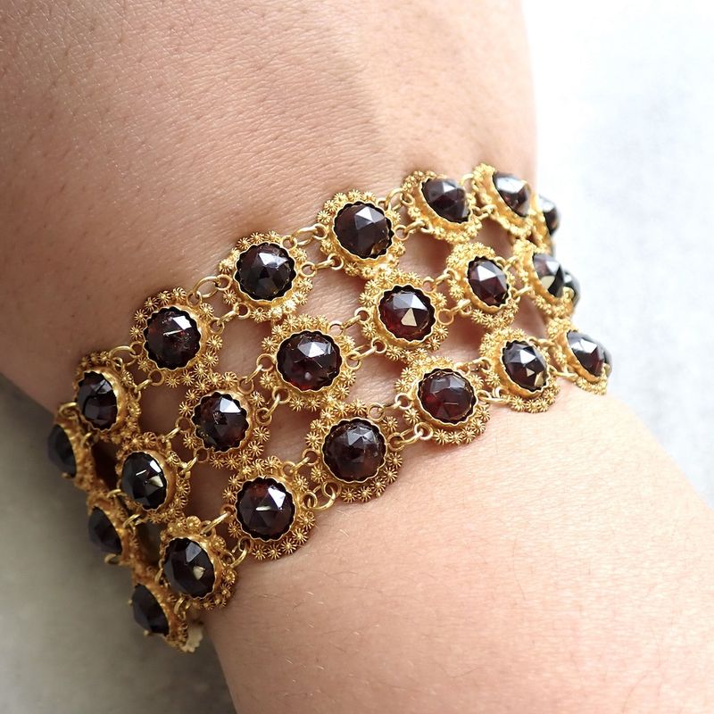 Image 2 of Antique gold bracelet with garnet stones.