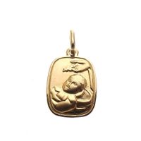 Gold pendant of a child's baptism