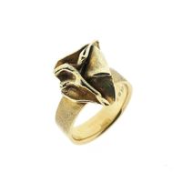 Golden ring with organic design