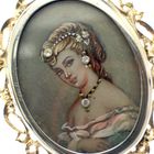 Image 3 of Vintage two-tone gold pendant/brooch with a painted portrait and diamonds; 0.015 ct.