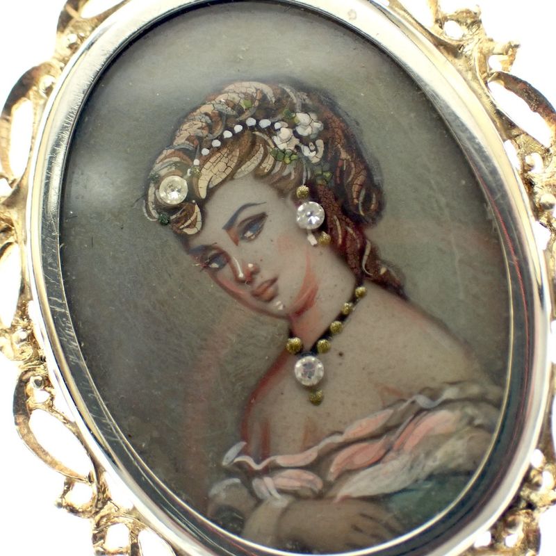 Image 3 of Vintage two-tone gold pendant/brooch with a painted portrait and diamonds; 0.015 ct.