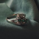 Image 2 of White gold ring with emerald and diamond | 0.09 ct.