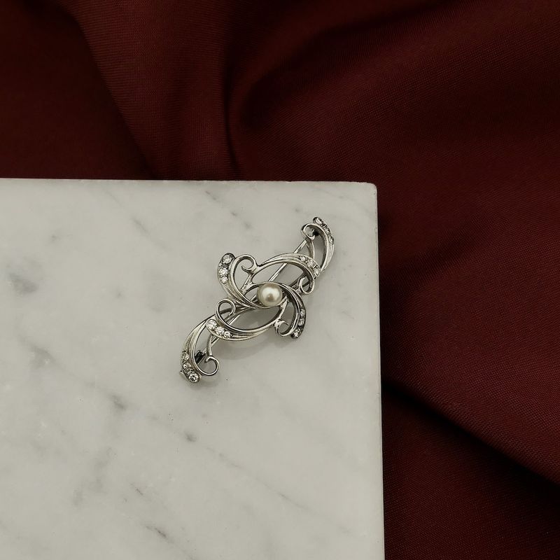 Image 2 of White gold Art Nouveau brooch set with pearl and diamond; 0.27 ct.
