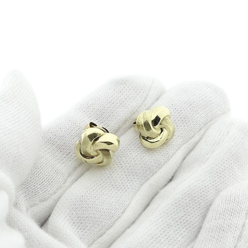Image 7 of Gold stud earrings with knotted design