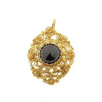Vintage gold pendant with garnet.